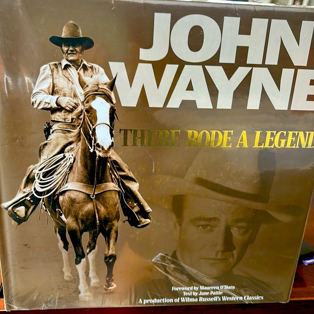 Book of John Wayne, a western legend classic. New in original wrapper.